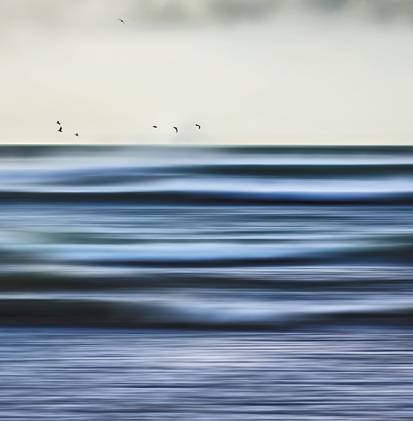 evocative image beyond the waves card design - abstract coastal art card, moody, gulls and waves