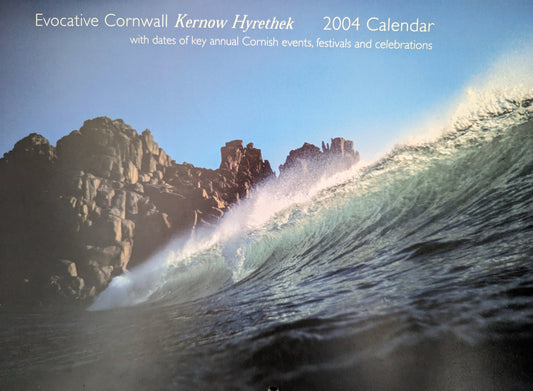 The first ever Evocative Cornwall calendar cover featuing a wave at Porthcurno