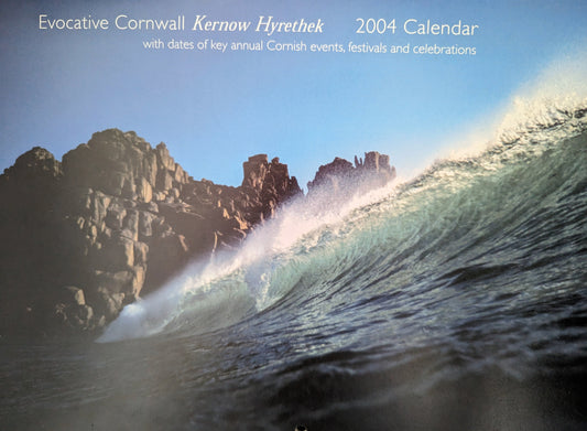 The first ever Evocative Cornwall calendar cover featuing a wave at Porthcurno