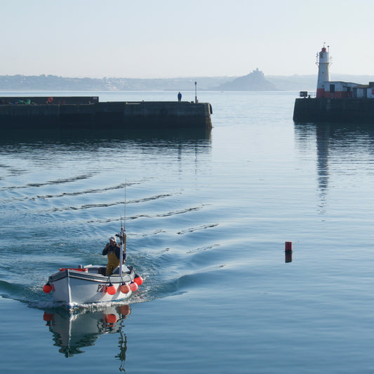 Fisherman returns to harbour, Newlyn