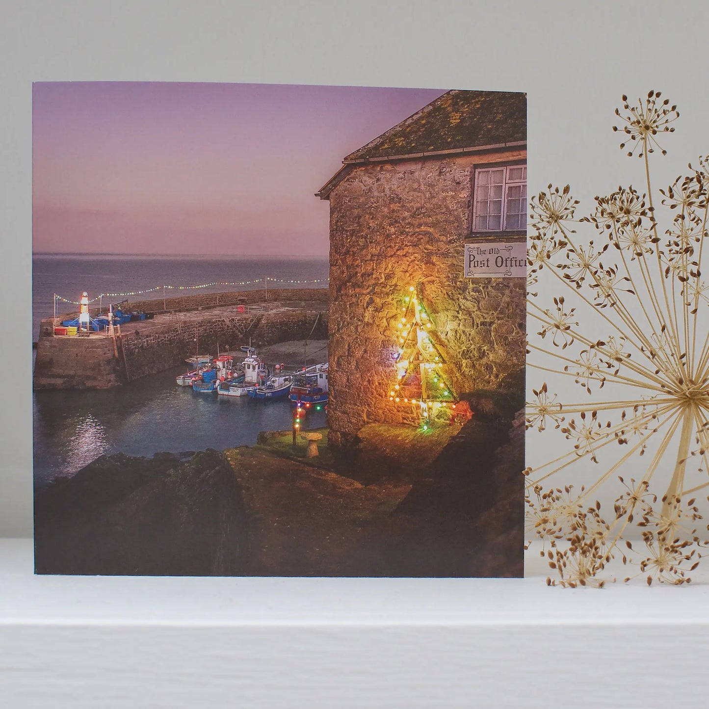 Cornish Christmas card Harbour Lights, Coverack on shelf