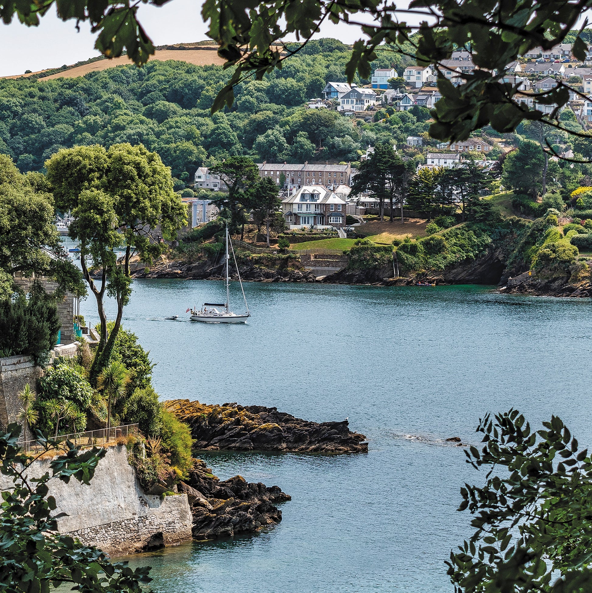 An Evocative Cornwall greetings card showing the view across the mouth of the River Fowey with a yacht sailing out to sea, the houses of Polruan opposite and Italianate gardens to the left of the cove