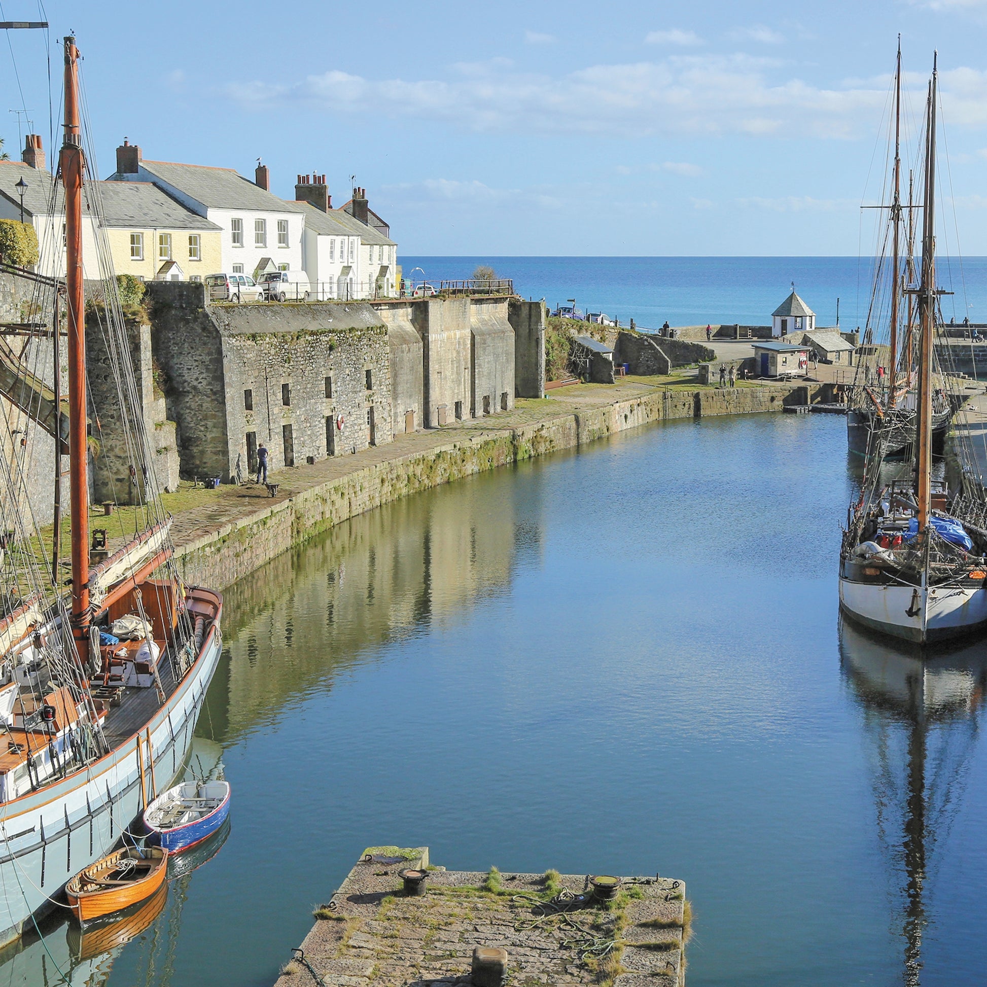 An Evocative Cornwall greetings card showing the historic harbour at Charlestown with its tall ships, on a beautiful day