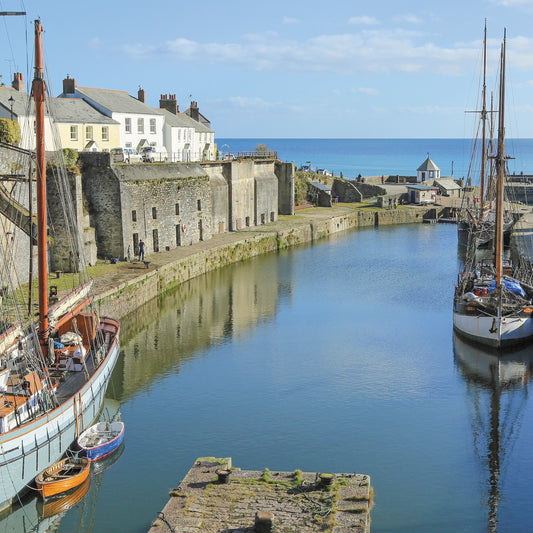 An Evocative Cornwall greetings card showing the historic harbour at Charlestown with its tall ships, on a beautiful day