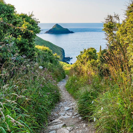 Cornish greetings card image of coastal path at sunset, near The Rumps