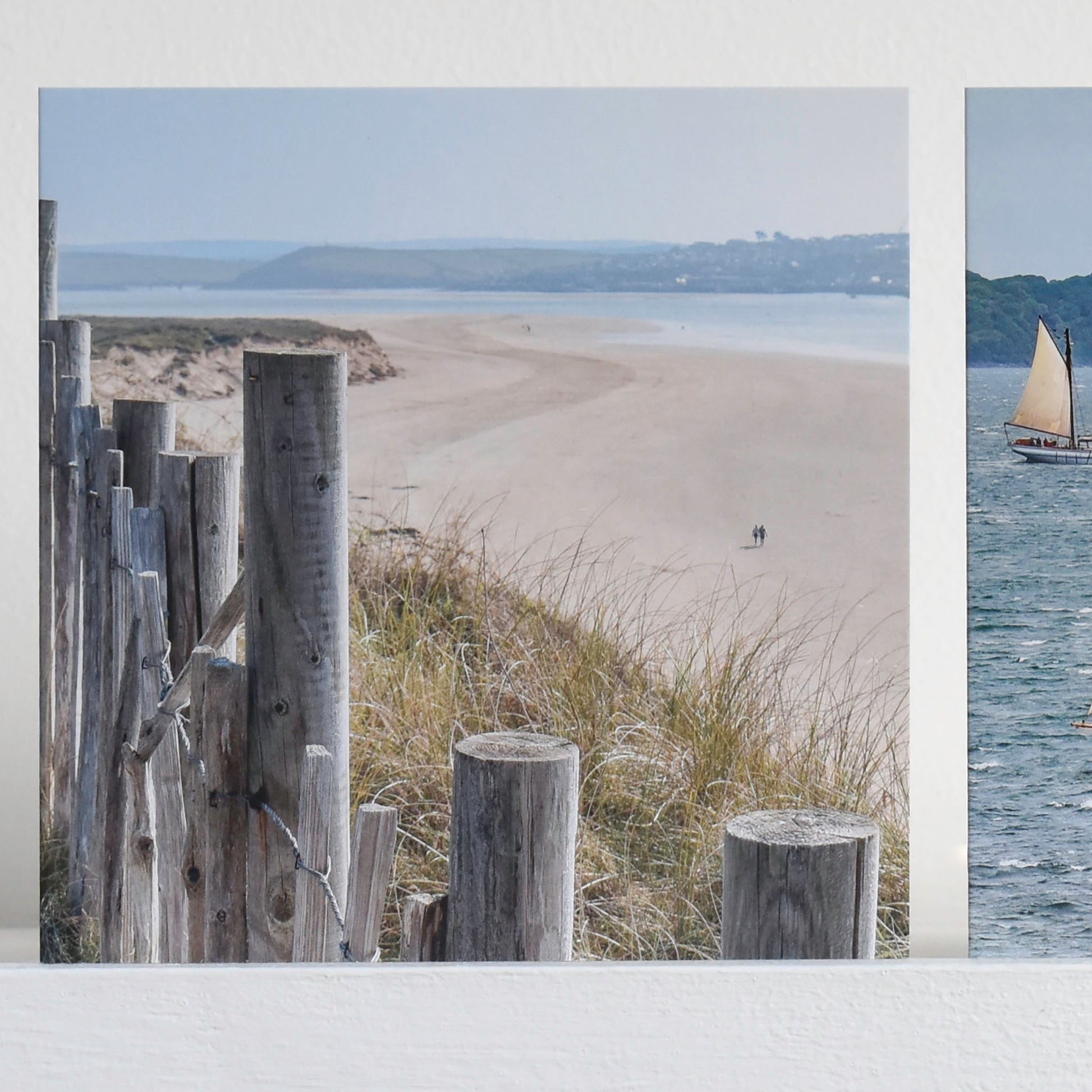 Cornish Greetings card with a view over the dunes between Daymer Bay and Rock, looking towards Padstow, with a couple strolling along the sand