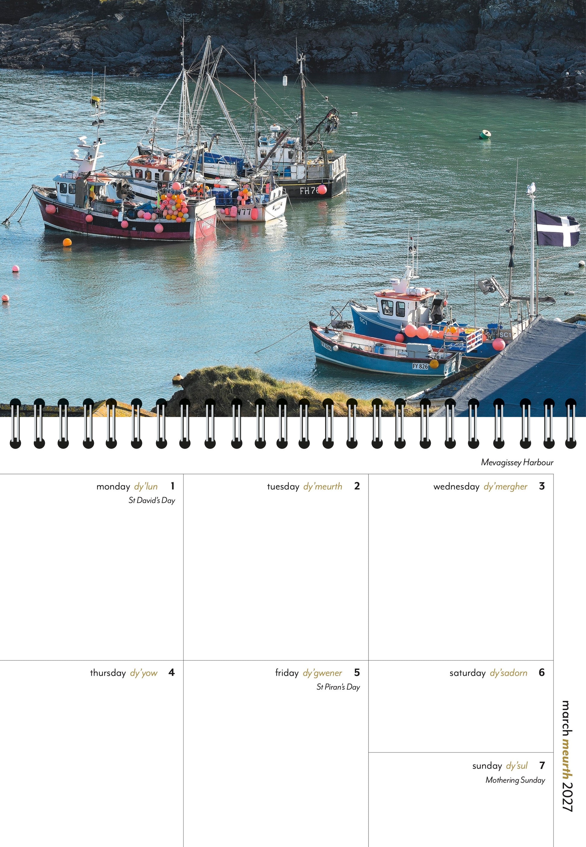 Inside the Evocative Cornwall Engagement Diary 2027 showing pages from March and an image of fishing boats in the harbour at Mevagissey