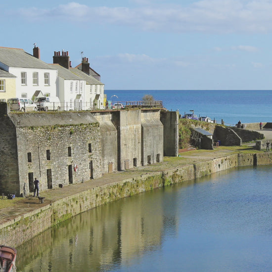 Video animation of greeting card image, showing Charlestown Harbour with 3 tall ships moored up, on a beautiful clear day