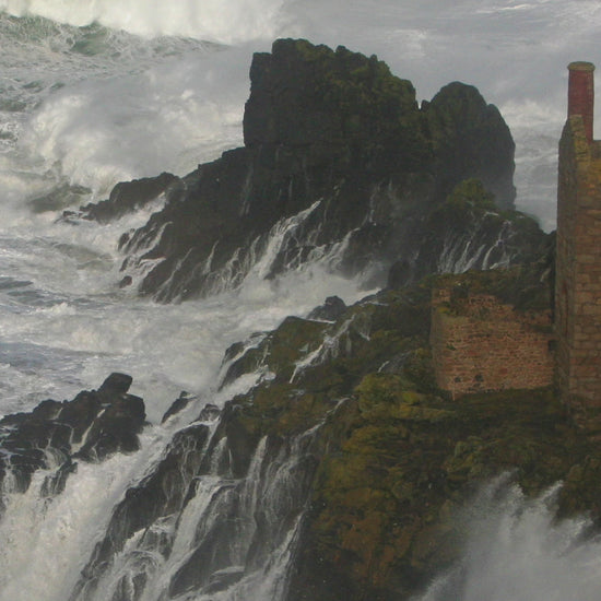 Video animation of greeting card showing The Crowns at Botallack perched on a rock with waves broiling around