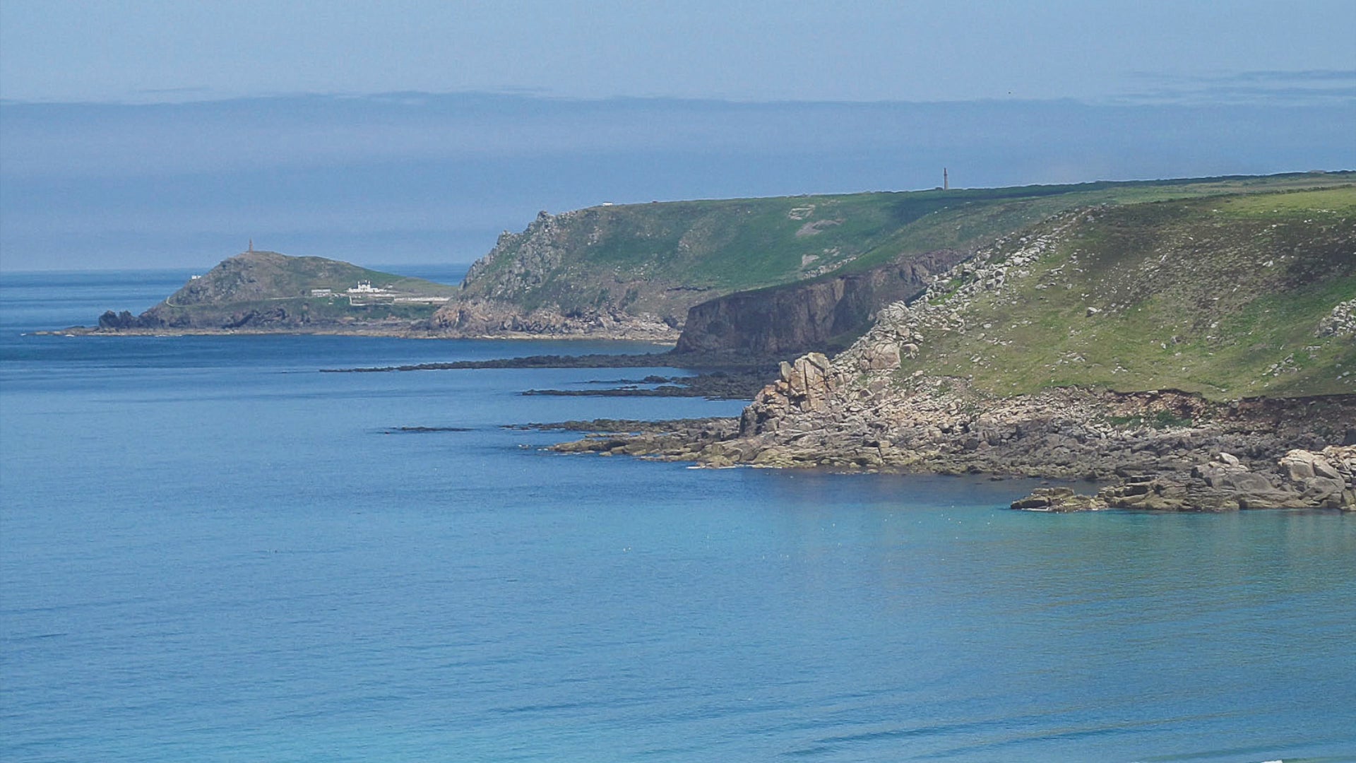 Video animation showing Whitesands Bay with Cape Cornwall in the background on a beautiful clear, calm day