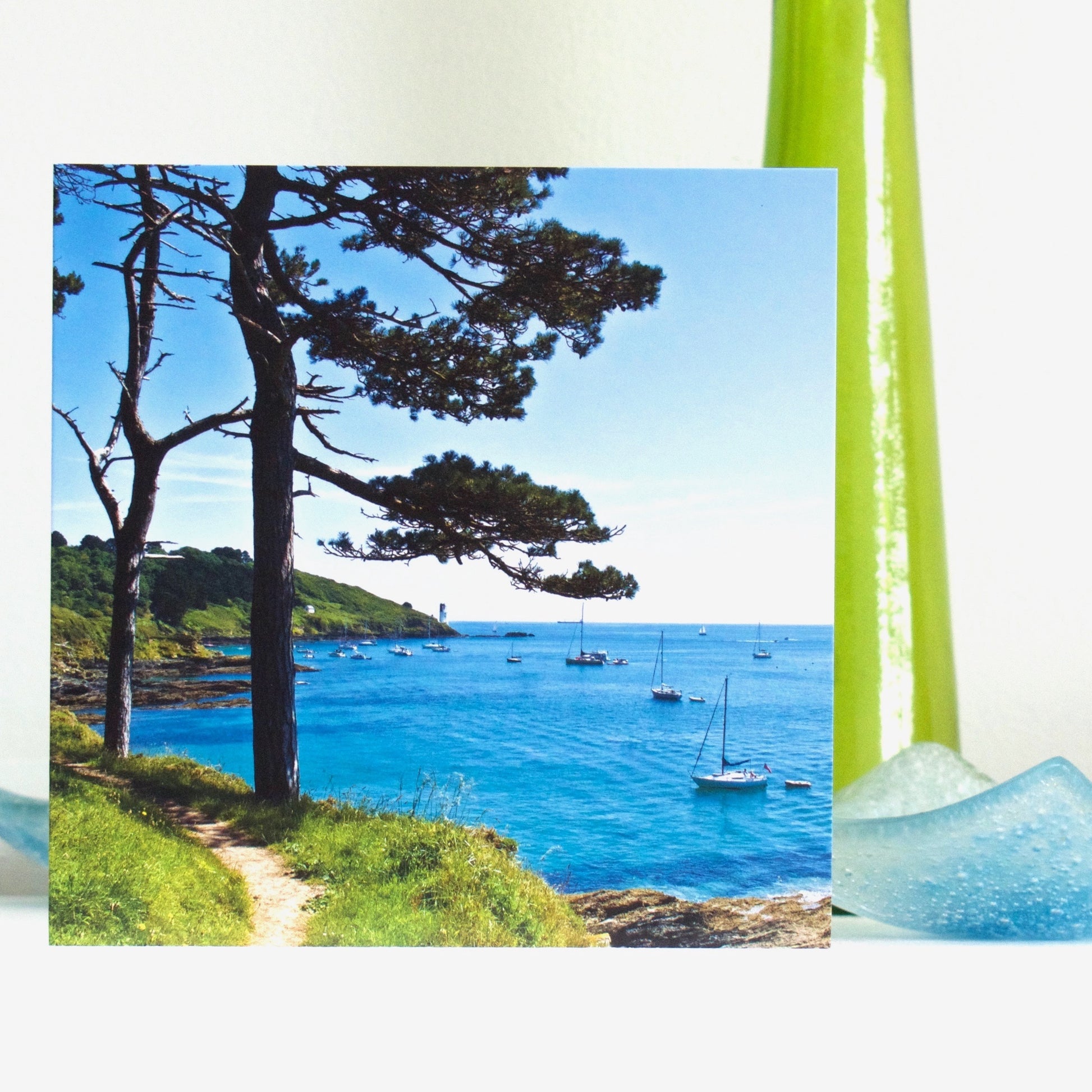 Evocative  Cornwall Greetings Card - Aquamarine, St Anthony Head - displayed on shelf